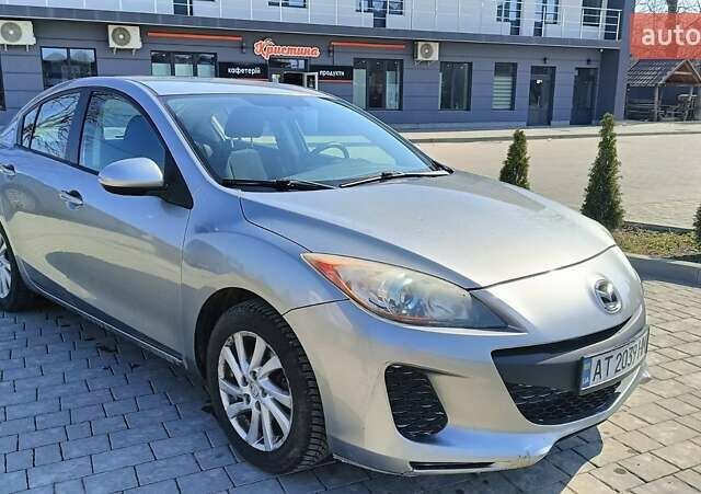 Серый Мазда 3, объемом двигателя 2 л и пробегом 181 тыс. км за 7700 $, фото 1 на Automoto.ua