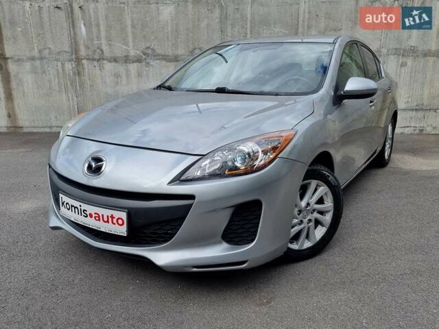 Серый Мазда 3, объемом двигателя 2 л и пробегом 190 тыс. км за 7599 $, фото 1 на Automoto.ua
