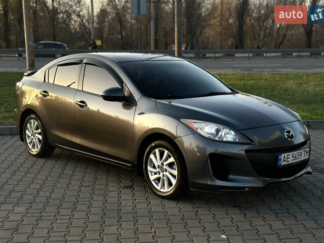 Сірий Мазда 3, об'ємом двигуна 2 л та пробігом 247 тис. км за 9500 $, фото 1 на Automoto.ua