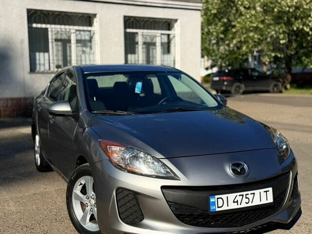 Сірий Мазда 3, об'ємом двигуна 2 л та пробігом 251 тис. км за 6999 $, фото 1 на Automoto.ua