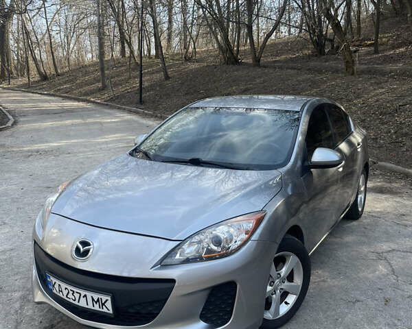 Серый Мазда 3, объемом двигателя 2 л и пробегом 170 тыс. км за 8700 $, фото 1 на Automoto.ua