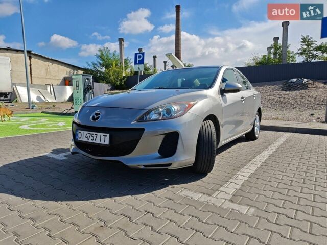 Серый Мазда 3, объемом двигателя 2 л и пробегом 252 тыс. км за 6799 $, фото 1 на Automoto.ua