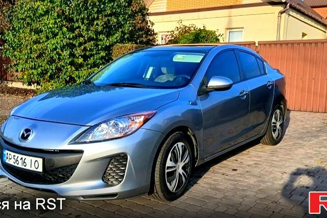 Серый Мазда 3, объемом двигателя 2 л и пробегом 225 тыс. км за 7200 $, фото 1 на Automoto.ua