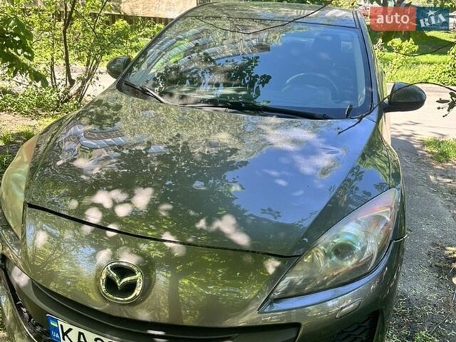 Серый Мазда 3, объемом двигателя 1.6 л и пробегом 135 тыс. км за 6200 $, фото 1 на Automoto.ua
