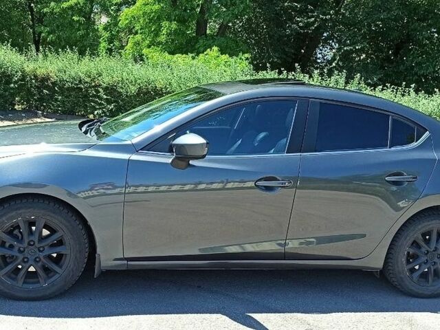 Серый Мазда 3, объемом двигателя 2 л и пробегом 227 тыс. км за 12000 $, фото 1 на Automoto.ua