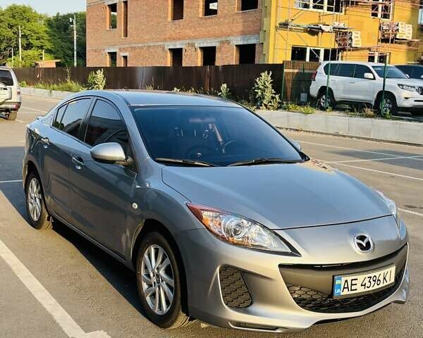 Серый Мазда 3, объемом двигателя 2 л и пробегом 106 тыс. км за 10500 $, фото 1 на Automoto.ua
