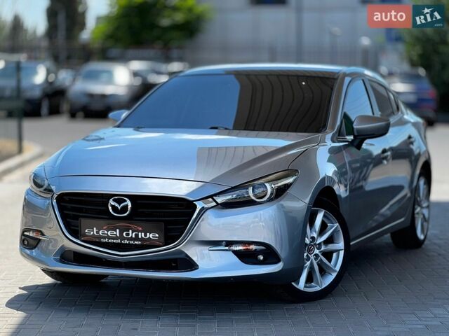 Сірий Мазда 3, об'ємом двигуна 2 л та пробігом 133 тис. км за 9699 $, фото 1 на Automoto.ua