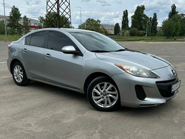 Сірий Мазда 3, об'ємом двигуна 2 л та пробігом 275 тис. км за 6700 $, фото 1 на Automoto.ua