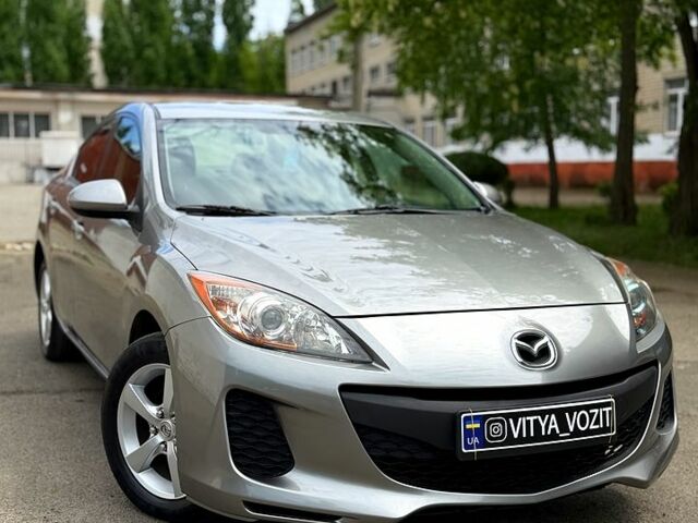 Серый Мазда 3, объемом двигателя 2 л и пробегом 249 тыс. км за 6700 $, фото 1 на Automoto.ua