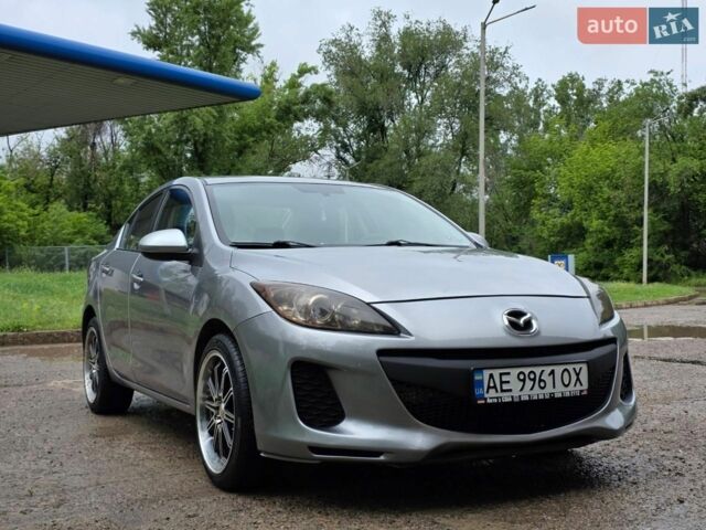 Серый Мазда 3, объемом двигателя 2 л и пробегом 187 тыс. км за 7999 $, фото 1 на Automoto.ua