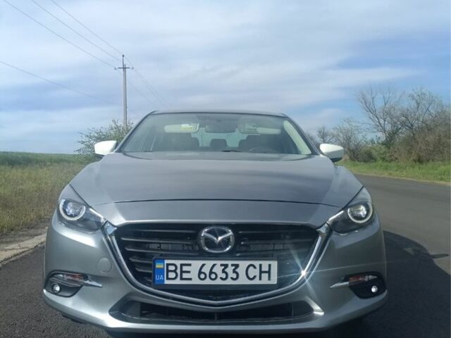 Серый Мазда 3, объемом двигателя 2 л и пробегом 128 тыс. км за 12000 $, фото 1 на Automoto.ua