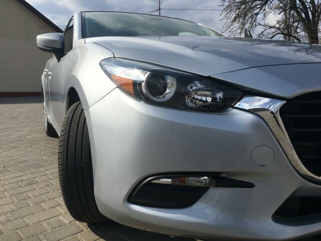 Сірий Мазда 3, об'ємом двигуна 2 л та пробігом 63 тис. км за 13999 $, фото 1 на Automoto.ua
