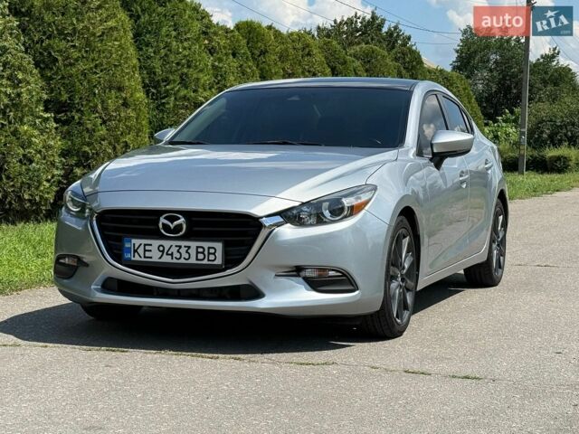 Серый Мазда 3, объемом двигателя 2 л и пробегом 145 тыс. км за 12000 $, фото 1 на Automoto.ua