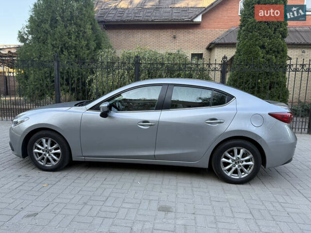 Серый Мазда 3, объемом двигателя 2 л и пробегом 186 тыс. км за 13000 $, фото 1 на Automoto.ua