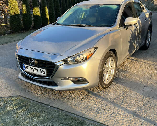 Серый Мазда 3, объемом двигателя 2 л и пробегом 53 тыс. км за 12100 $, фото 1 на Automoto.ua