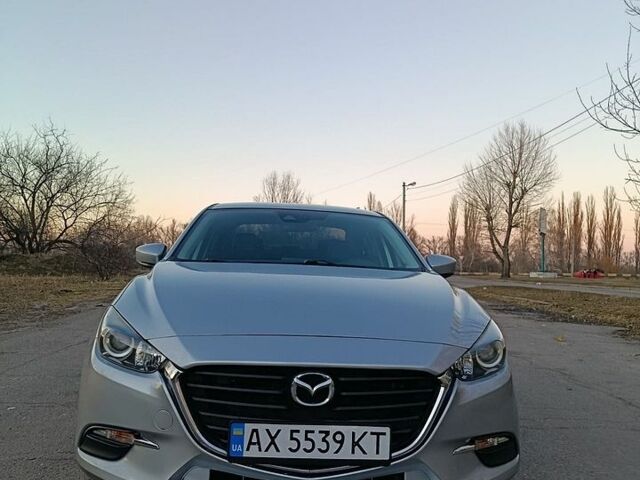 Серый Мазда 3, объемом двигателя 2 л и пробегом 211 тыс. км за 11000 $, фото 1 на Automoto.ua