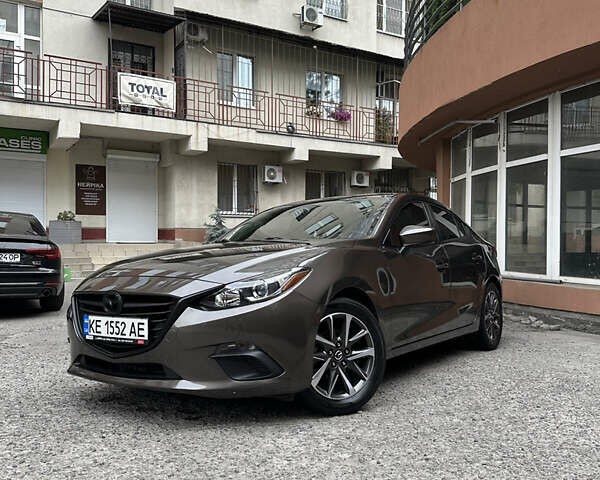 Серый Мазда 3, объемом двигателя 2 л и пробегом 150 тыс. км за 12900 $, фото 1 на Automoto.ua