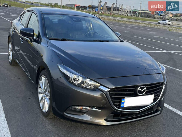 Серый Мазда 3, объемом двигателя 2 л и пробегом 80 тыс. км за 15900 $, фото 1 на Automoto.ua