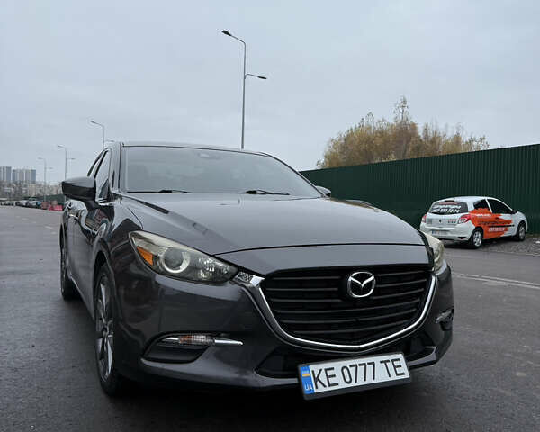 Серый Мазда 3, объемом двигателя 2.49 л и пробегом 74 тыс. км за 15000 $, фото 1 на Automoto.ua