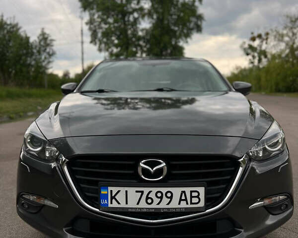 Серый Мазда 3, объемом двигателя 1.5 л и пробегом 156 тыс. км за 14300 $, фото 1 на Automoto.ua