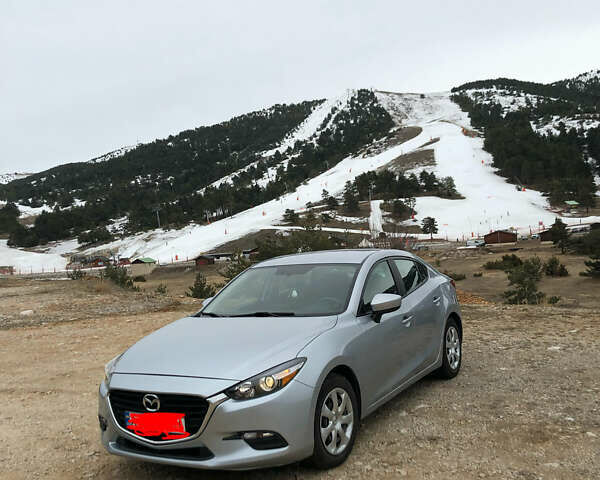 Серый Мазда 3, объемом двигателя 2 л и пробегом 90 тыс. км за 9444 $, фото 1 на Automoto.ua
