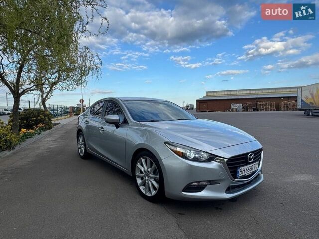 Серый Мазда 3, объемом двигателя 2 л и пробегом 141 тыс. км за 12900 $, фото 1 на Automoto.ua