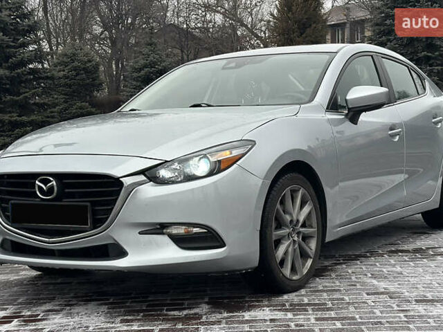 Серый Мазда 3, объемом двигателя 2.5 л и пробегом 119 тыс. км за 13999 $, фото 1 на Automoto.ua