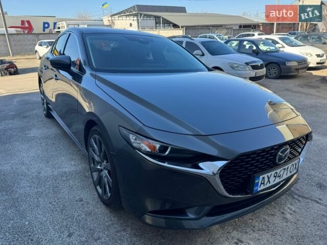 Серый Мазда 3, объемом двигателя 2.49 л и пробегом 113 тыс. км за 18999 $, фото 1 на Automoto.ua