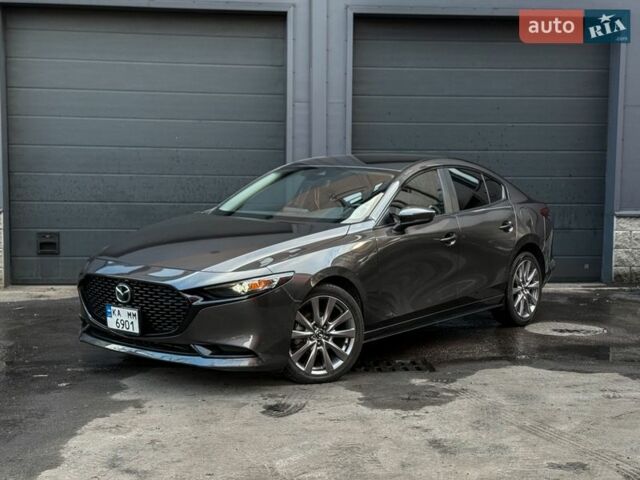 Серый Мазда 3, объемом двигателя 2.49 л и пробегом 102 тыс. км за 14999 $, фото 1 на Automoto.ua