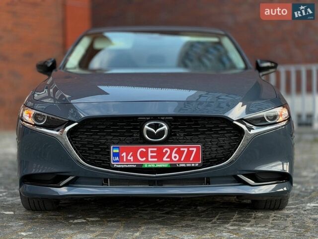 Серый Мазда 3, объемом двигателя 2.49 л и пробегом 32 тыс. км за 12900 $, фото 1 на Automoto.ua