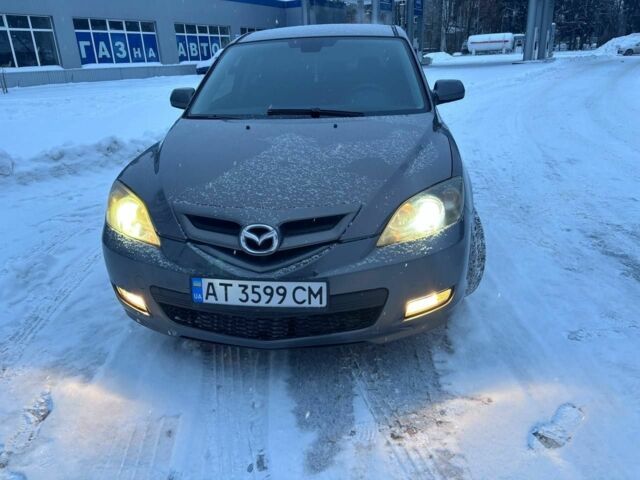 Серый Мазда 3, объемом двигателя 1.6 л и пробегом 258 тыс. км за 4200 $, фото 1 на Automoto.ua