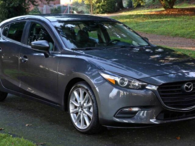 Серый Мазда 3, объемом двигателя 2 л и пробегом 50 тыс. км за 2000 $, фото 1 на Automoto.ua