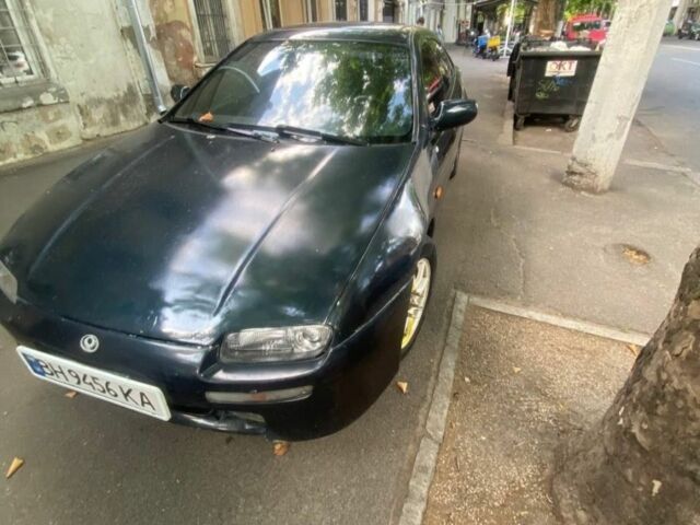 Синий Мазда 3, объемом двигателя 1.5 л и пробегом 250 тыс. км за 1350 $, фото 1 на Automoto.ua