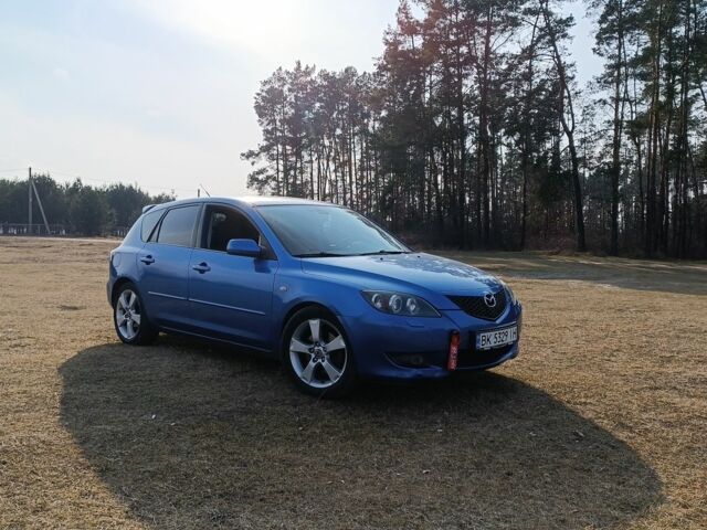 Синий Мазда 3, объемом двигателя 2 л и пробегом 238 тыс. км за 3600 $, фото 1 на Automoto.ua