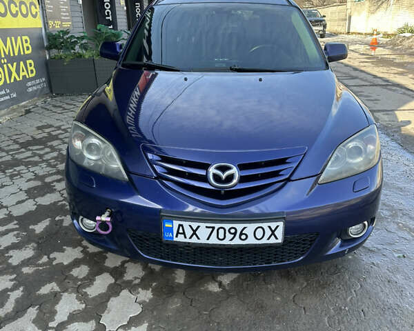 Синий Мазда 3, объемом двигателя 2 л и пробегом 273 тыс. км за 4200 $, фото 1 на Automoto.ua