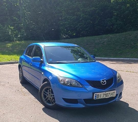 Синий Мазда 3, объемом двигателя 1.4 л и пробегом 178 тыс. км за 4199 $, фото 1 на Automoto.ua