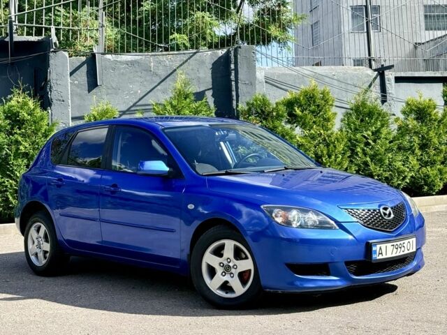Синий Мазда 3, объемом двигателя 1.6 л и пробегом 250 тыс. км за 4199 $, фото 1 на Automoto.ua
