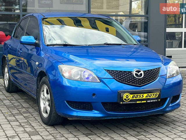 Синий Мазда 3, объемом двигателя 1.35 л и пробегом 182 тыс. км за 3900 $, фото 1 на Automoto.ua