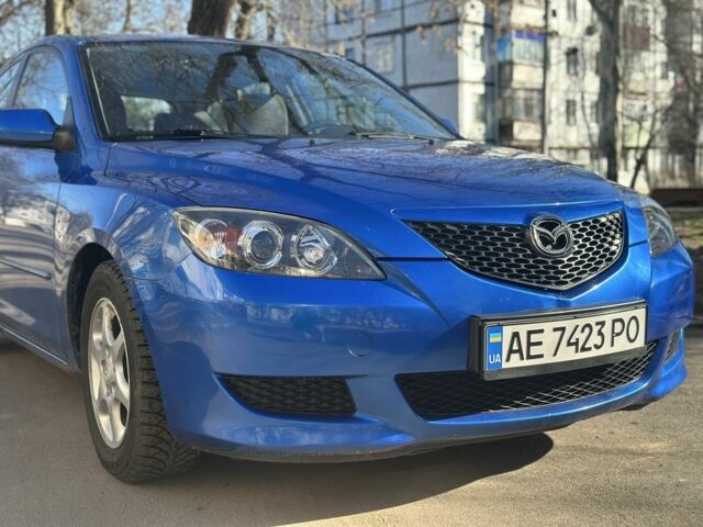 Синий Мазда 3, объемом двигателя 1.3 л и пробегом 256 тыс. км за 4000 $, фото 1 на Automoto.ua