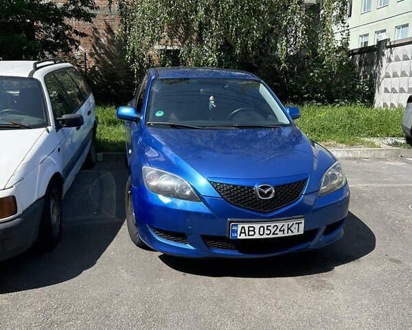 Синий Мазда 3, объемом двигателя 1.35 л и пробегом 170 тыс. км за 3900 $, фото 1 на Automoto.ua