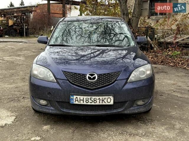 Синий Мазда 3, объемом двигателя 1.6 л и пробегом 287 тыс. км за 2100 $, фото 1 на Automoto.ua