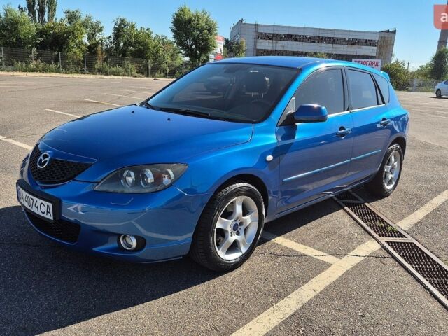 Синий Мазда 3, объемом двигателя 2 л и пробегом 201 тыс. км за 4400 $, фото 1 на Automoto.ua