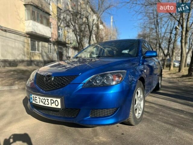 Синий Мазда 3, объемом двигателя 1.4 л и пробегом 256 тыс. км за 4000 $, фото 1 на Automoto.ua