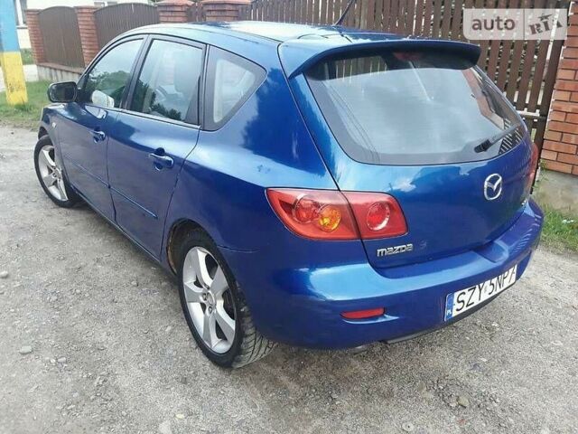 Синий Мазда 3, объемом двигателя 1.6 л и пробегом 234 тыс. км за 2000 $, фото 1 на Automoto.ua