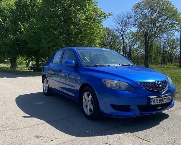 Синий Мазда 3, объемом двигателя 1.56 л и пробегом 300 тыс. км за 3900 $, фото 1 на Automoto.ua
