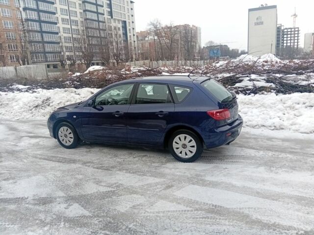 Синій Мазда 3, об'ємом двигуна 1.3 л та пробігом 260 тис. км за 4700 $, фото 1 на Automoto.ua
