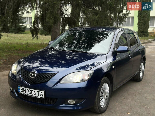 Синий Мазда 3, объемом двигателя 1.6 л и пробегом 237 тыс. км за 3950 $, фото 1 на Automoto.ua