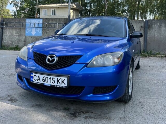 Синій Мазда 3, об'ємом двигуна 1.3 л та пробігом 214 тис. км за 4004 $, фото 1 на Automoto.ua