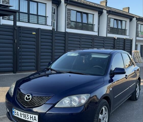 Синий Мазда 3, объемом двигателя 1.6 л и пробегом 319 тыс. км за 3502 $, фото 1 на Automoto.ua