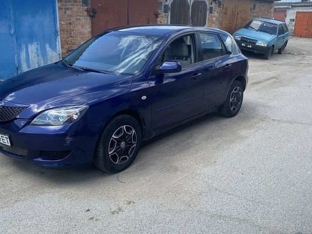 Синій Мазда 3, об'ємом двигуна 1.4 л та пробігом 269 тис. км за 4103 $, фото 1 на Automoto.ua